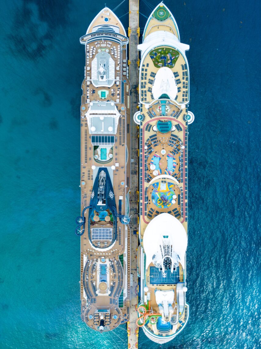 Two cruise ships on body of water
